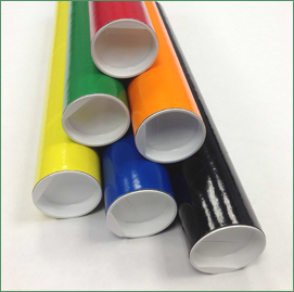 Group of mailing tubes of different colors with white plugs